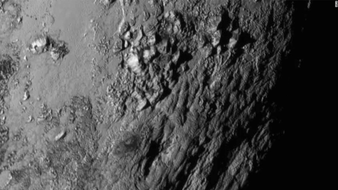 Close-up images of a region near Pluto&#39;s equator revealed a giant surprise: a range of youthful mountains. NASA released the image on July 15.