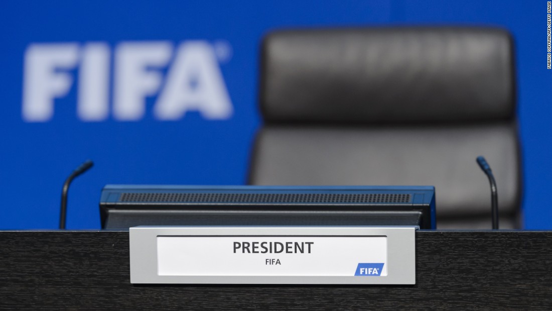 Before being ushered off the stage, Nelson showered Blatter with what appeared to be fake money.