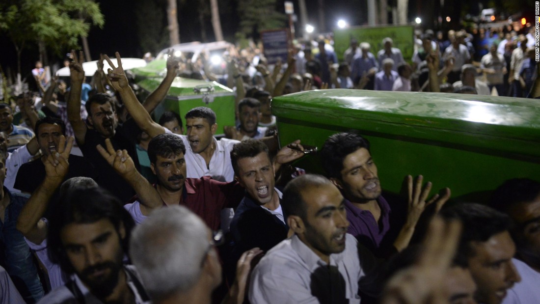 People carry victims&#39; coffins through the streets of Gaziantep, Turkey, on July 20.