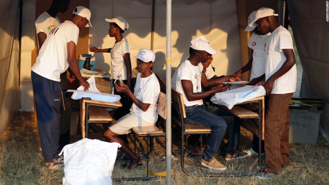 Election officials prepare the ballots on July 21.