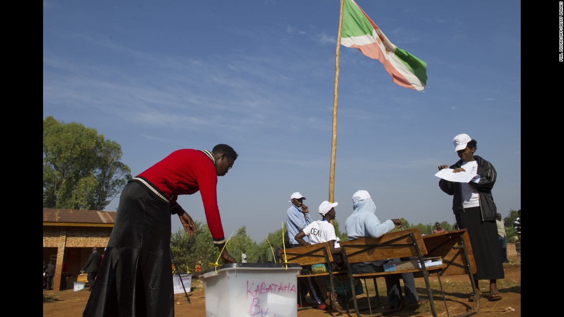 A woman casts her ballot at a polling station in Buye on July 21.