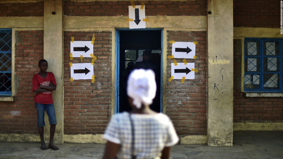 A woman arrives at a polling station in Bujumbura on July 21.