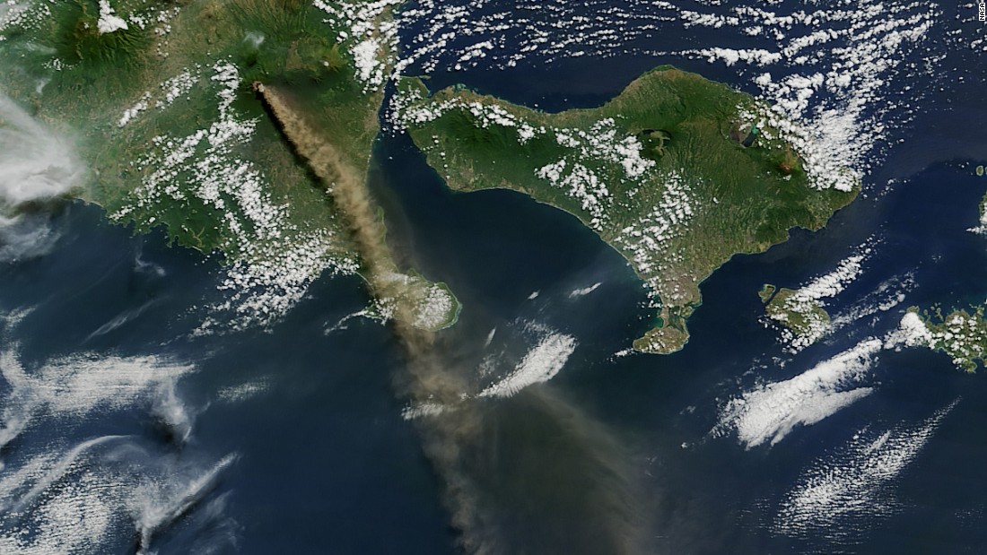 Mt. Raung is seen spewing ash and volcanic gases in this image taken on July 12 by NASA&#39;s Aqua satellite. The eruption forced hundreds of flights to and from Bali and other regional airports to be canceled. The ash clouds went as high as 20,000 feet (6 kilometers) into the air.