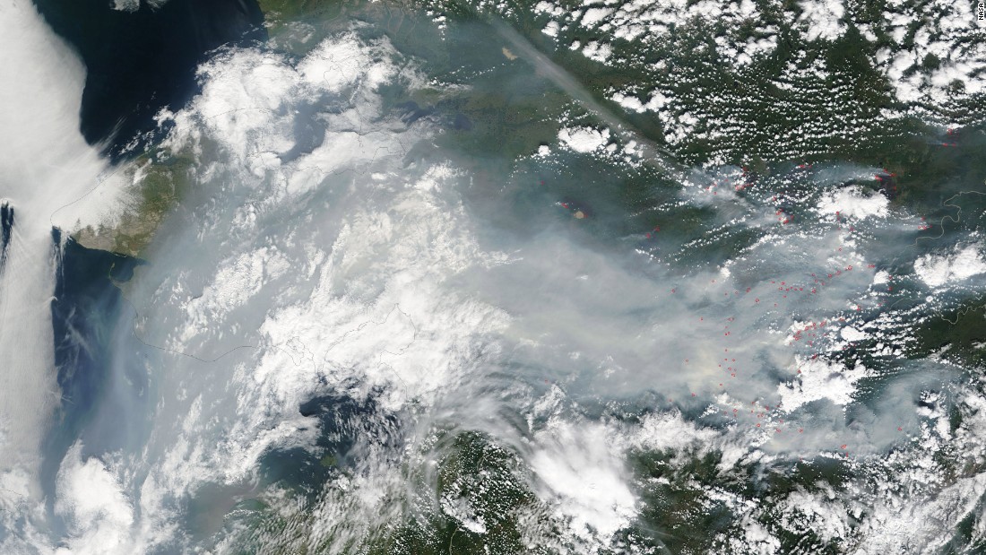 Fires have burned thousands of acres in Alaska. NASA&#39;s Terra satellite took this photo of smoke of smoke and haze over Alaska on July 12. Fires are outlined in red. The Alaska Interagency Coordination Center says about 300 fires were actively burning when the image was taken. 