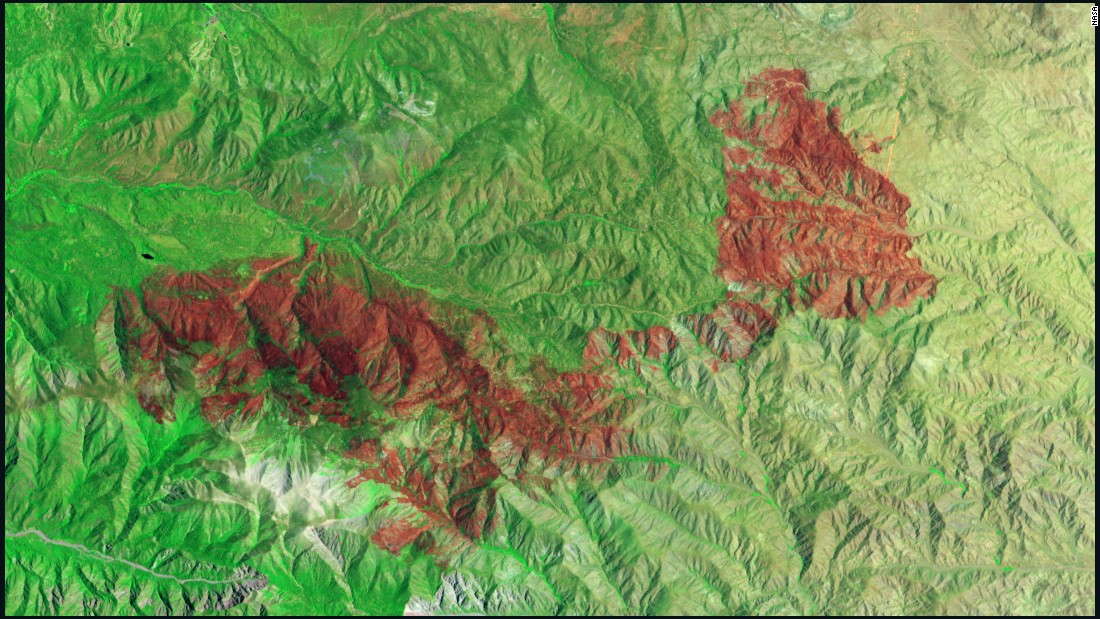 A fire raging in California&#39;s San Bernardino National Forest had scorched thousands of acres by early July. NASA&#39;s Earth Observing-1 satellite took this false-color image of a burned area spanning 49 square miles (127 square kilometers) on July 3. The burned areas appear dark red because they&#39;re reflecting shortwave infrared light.