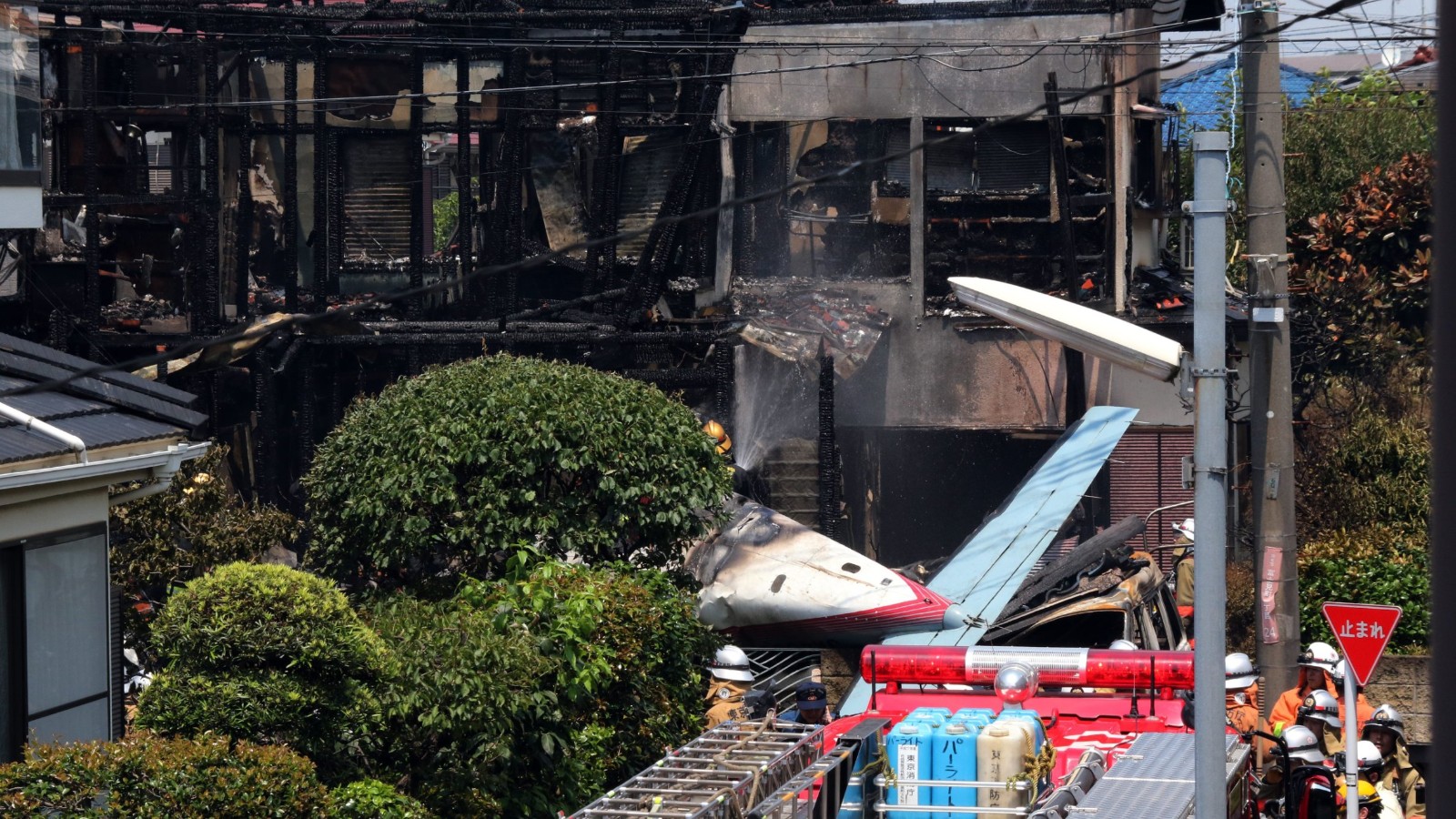 Plane crashes into Tokyo suburb, killing 3 CNN
