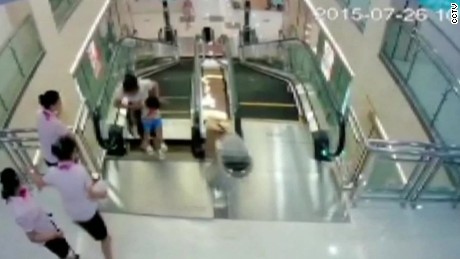 Man Watches Wife Die In China Escalator Accident - 