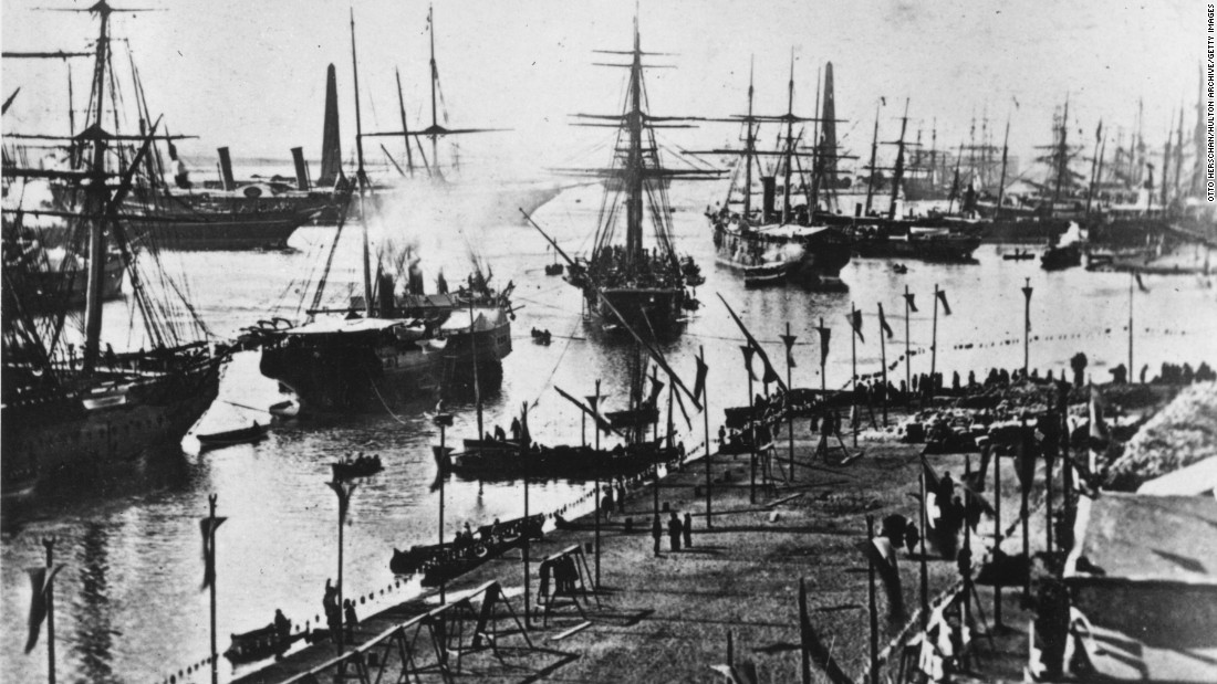 A fleet of ships enter the Suez Canal at its inauguration on November 17, 1869. Egypt was the first recorded country to dig a man-made canal across its land for international trade. Connecting the Mediterranean Sea to the Red Sea via the Nile, the Suez Canal is the shortest route between the east and the west.
