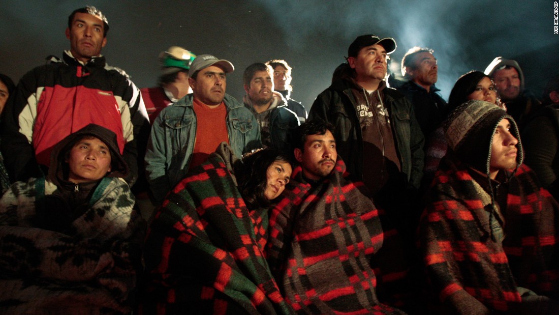 Relatives stand by as rescuers work to free 33 miners trapped inside the San Jose mine near Copiapo, Chile, on August 6, 2010. The mine collapsed a day earlier, and the miners ended up trapped 2,300 feet underground for more than two months. See how the rescue operation unfolded.