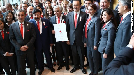 Kazakhstan&#39;s Prime Minister, Minister of Foreign Affairs, and President of the National Olympic Committee are pictured with bid committee members presenting their bid.