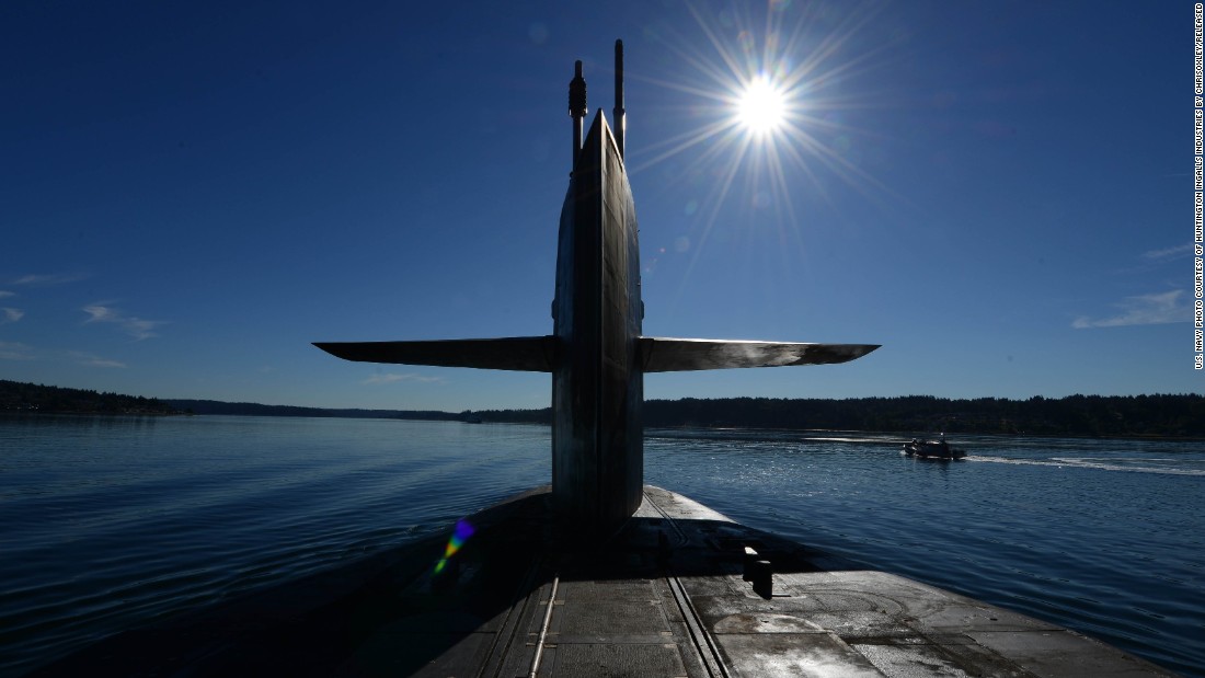 The Ohio-class guided-missile submarine USS Ohio transits Puget Sound, Washington, in June 2015. The Ohio and three other guided-missile subs -- USS Florida, USS Michigan and USS Georgia -- were originally built and deployed as ballistic-missile subs, but were converted to guided-missile platforms beginning in 2002 after the Navy concluded it had a surplus of the boomers.