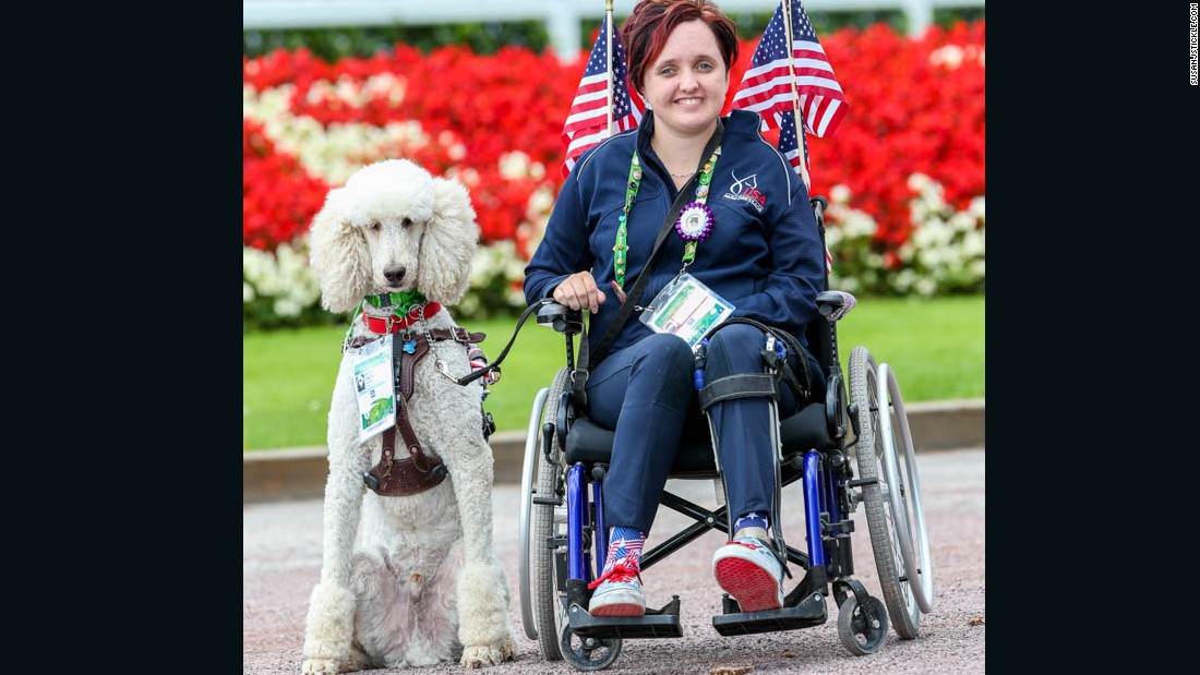A tumor behind Collier&#39;s right eye has made her partially blind. Her service dog, a white standard poodle  called &quot;Journey&quot; has has become a star in his own right. &quot;Journey is amazing,&quot; she says. &quot;The list of things he can do is probably longer than the list of things I can do.&quot;