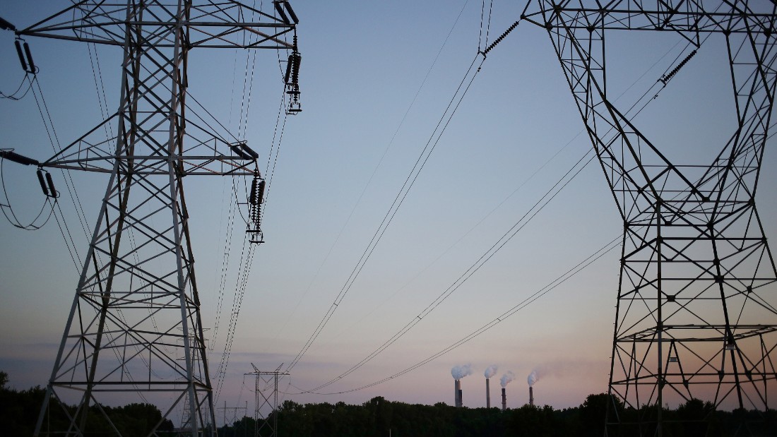 Powerlines stand near the Duke Energy Corp. Gibson Station power plant in Owensville, Indiana, U.S., on Thursday, July 23, 2015. Coal reclaimed its ranking as the top fuel for generating electricity at U.S. power plants in May, beating natural gas, which took the number one spot for the first time in April.