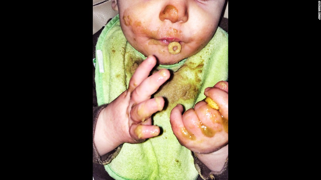 Photographer Justin Tsucalas captures colorfully grotesque moments every parent will recognize in his series, &lt;a href=&quot;http://lookatthismessybaby.tumblr.com/&quot; target=&quot;_blank&quot;&gt;&quot;Look at this messy baby.&quot;&lt;/a&gt; This was taken when his son Oliver started eating cereal Os, one of his first finger foods. &quot;Needless to say, they didn&#39;t all make it into his mouth and Michele and I started finding them everywhere: in our bed, hidden in his onesies and buried in the carpet. They would explode under foot and so we affectionately coined them &#39;baby land mines.&#39; &quot;