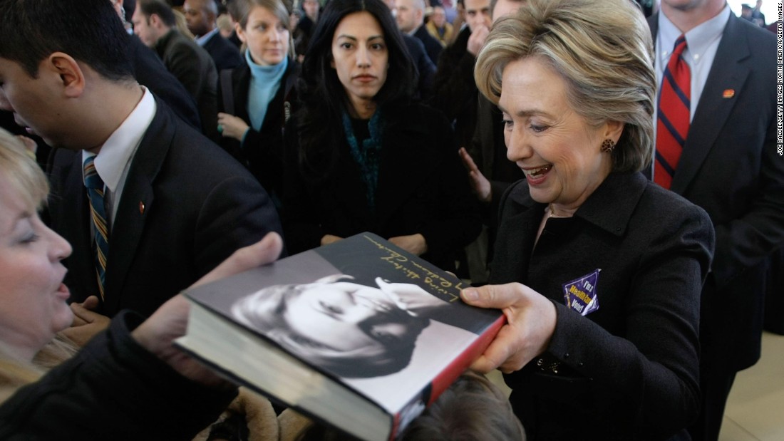 Clinton (right) greets people during a campaign stop at Aeroservices, Inc. on January 4, 2008 in Nashua, New Hampshire, accompanied by Abedin.