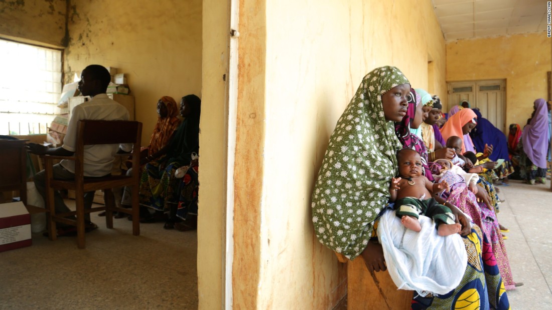 Healthcare workers administer the oral polio vaccine along with routine immunizations at a clinic in Sumaila District. Polio vaccine coverage in the district is an impressive 85%.