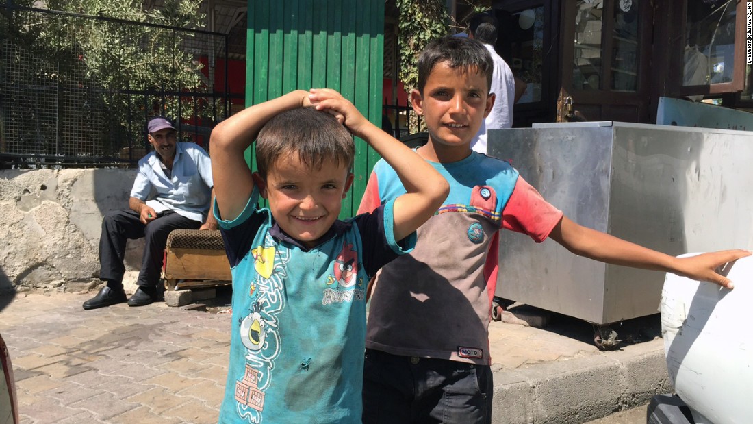 Ali, 5, and his brother Alla, 9, fled with their family to Damascus when their home in Idlib was destroyed by fighting. People in the capital are trying to maintain some sense of normalcy despite the ongoing war.