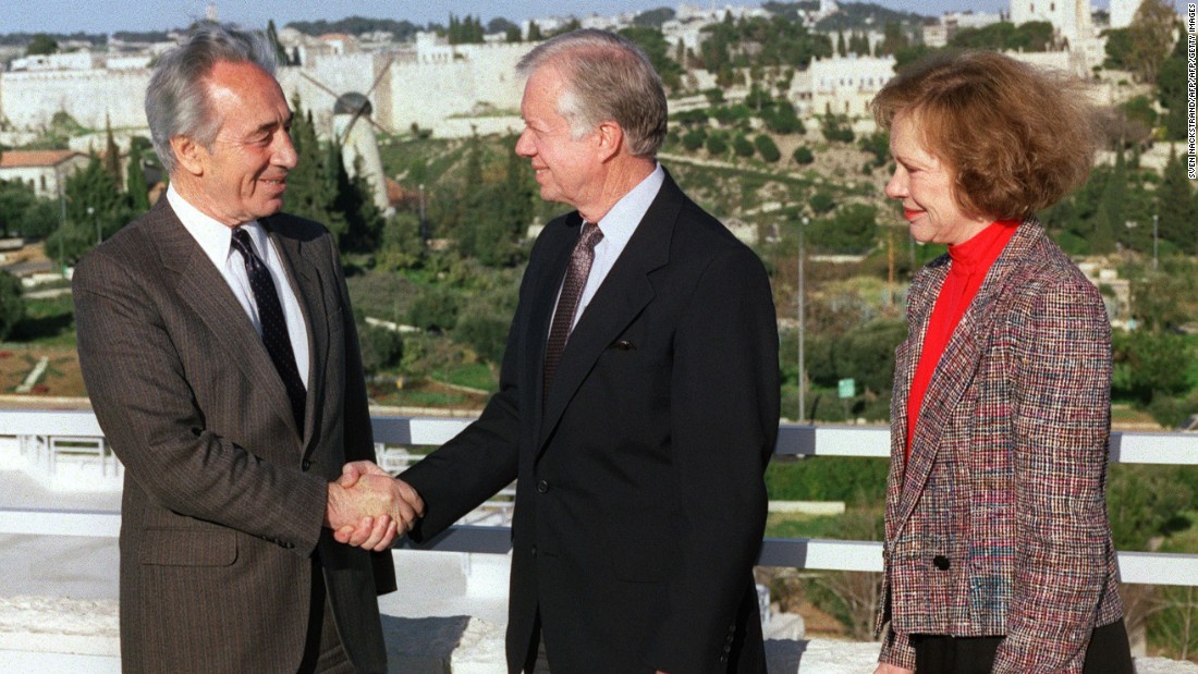 Carter shakes hands with Israeli Labour Party leader Shimon Peres in Jerusalem in March 1990. 