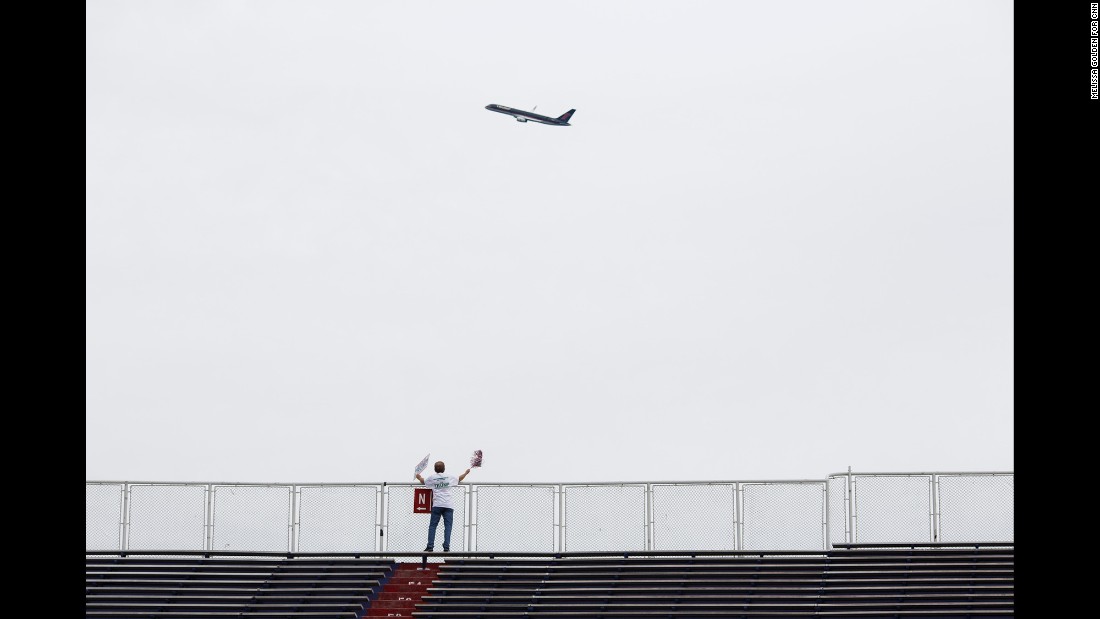 Trump&#39;s 757 plane circles the venue as he arrives. Trump flew by the stadium in his private jet shortly before 6 p.m., doing a loop around the arena before landing. The fly-by was announced over the stadium&#39;s loudspeaker to cheers.