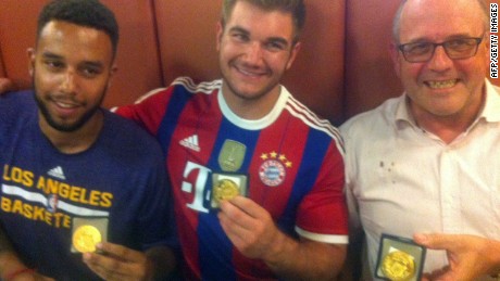 From left:  Anthony Sadler, from Pittsburg, California, Alek Skarlatos from Roseburg, Oregon, and British national Chris Norman -- who is living in France -- hold medals they received for stopping a gunman on a European train.