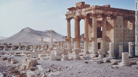 Why does ISIS destroy antiquities?