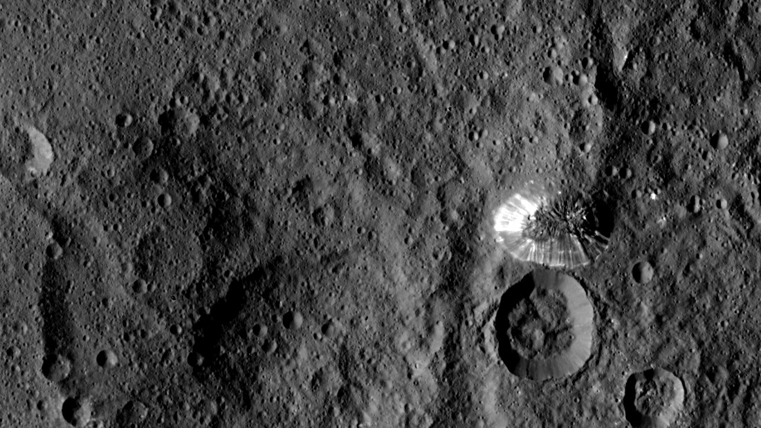 This tall, conical mountain on Ceres was photographed from a distance of 915 miles (1,470 kilometers) by NASA's Dawn spacecraft. The mountain, located in the dwarf planet's southern hemisphere, is 4 miles (6 kilometers) high. The photo was taken on August 19, 2015.