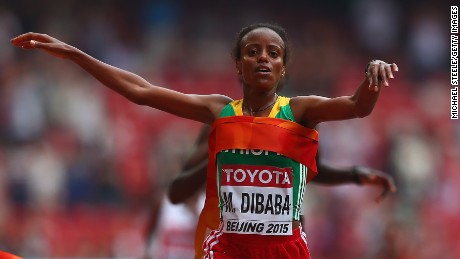 Mare Dibaba of Ethiopia takes gold in the women&#39;s marathon after a sprint finish in the Bird&#39;s Nest Stadium.
