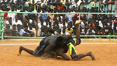 The wrestling tournaments attract hundreds of spectators in Khartoum. 