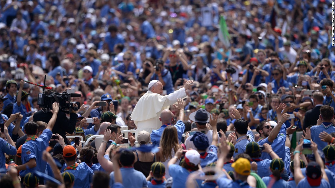 Pope Francis greets a crowd of Italian Catholic boy scouts and girl guides at St. Peter&#39;s Square on Saturday, June 13, 2015.