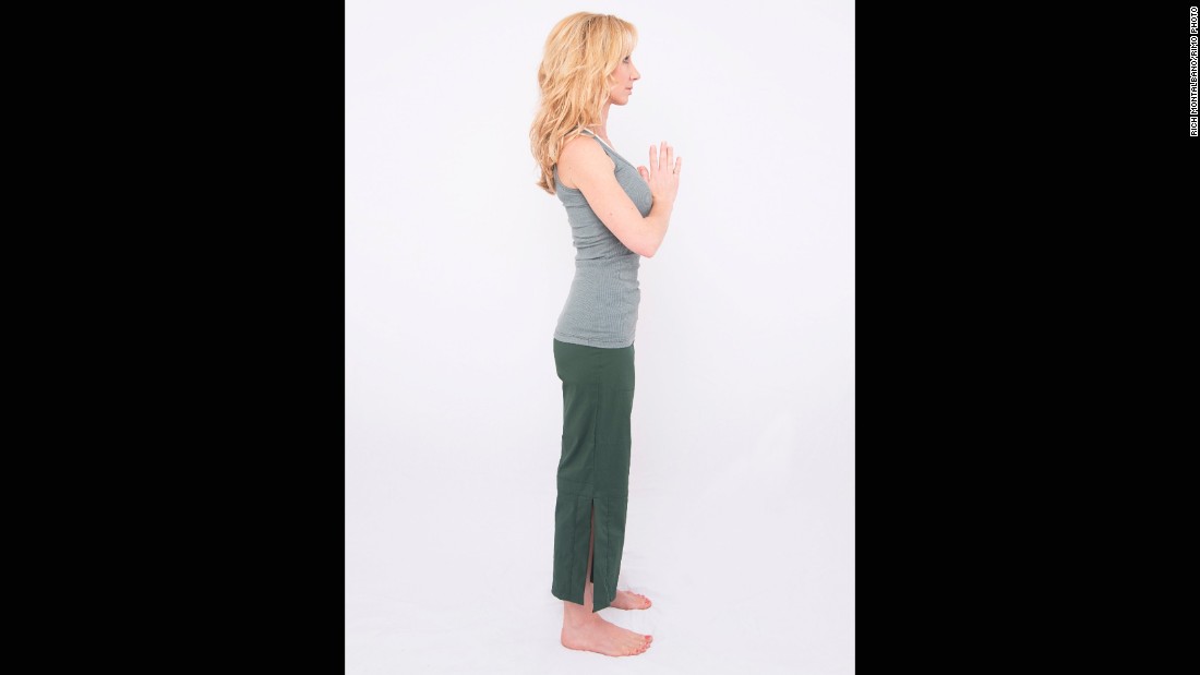 When you first get out of bed, stand with feet hip distance and palms together at the center of your chest.&lt;br /&gt;