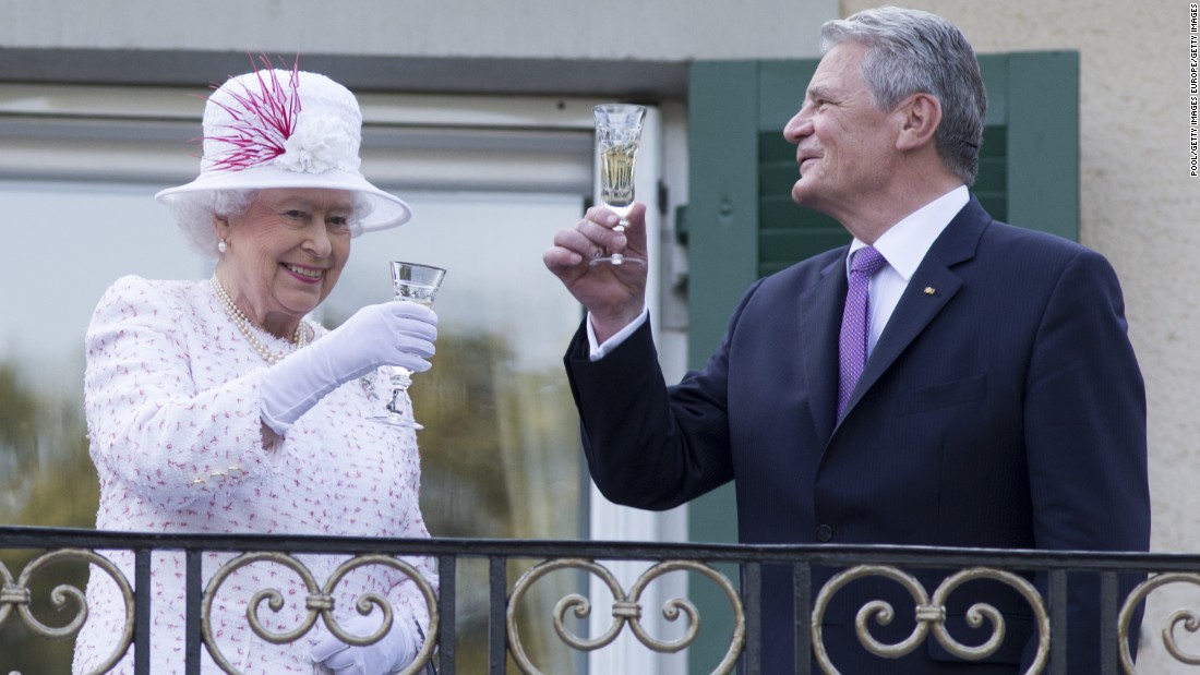 The Queen raises a glass with the President of Germany, Joachim Gauck, as they attend a garden party at the British Embassy residence on a &lt;a href=&quot;http://edition.cnn.com/2015/06/23/europe/uk-germany-queen-state-visit/&quot;&gt;state visit &lt;/a&gt;to the country on June 25, 2015 in Berlin. 