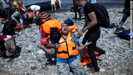 Refugees board rubber rafts for Europe