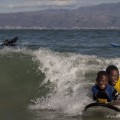 Waves for Change children surfing