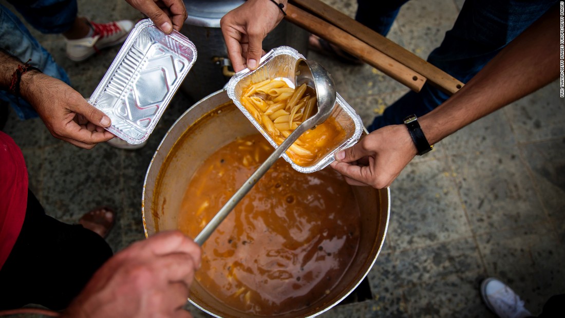 Local relief agencies work to feed the migrants before they make their onward journey. The U.N. says approximately 50 boats of migrants land on Lesbos each day, depositing from 1,500 to 3,000 new immigrants.