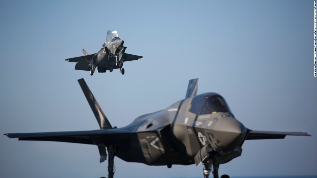 Two F-35B Lightning II fighters complete vertical landings aboard the amphibious assault ship USS Wasp during the opening day of the first session of operational testing in May 2015. As the future of Marine Corps aviation, the F-35B is designed to eventually replace all aircraft from three legacy Marine Corps platforms; the AV-8B Harrier, the F/A-18 Hornet, and the EA-6B Prowler. 