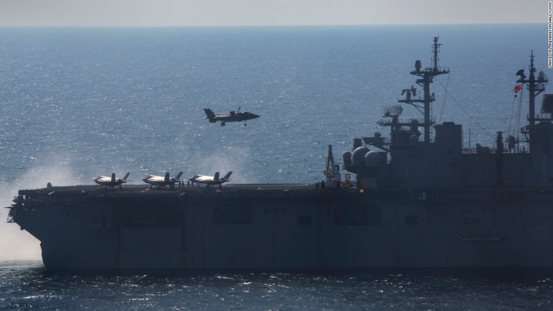 An F-35 B Lightning II fighter lands on the flight deck of the amphibious assault ship USS Wasp during short take-off, vertical landing operations in May. A new Pentagon report says the testing did not adequately reflect conditions the aircraft would face in real operations.