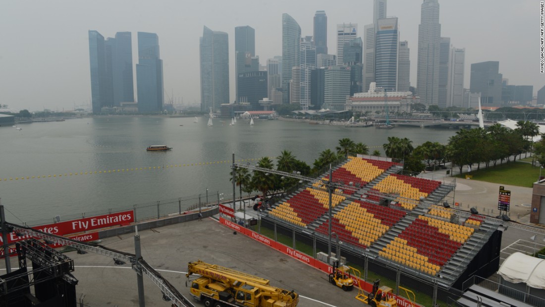 The Singapore waterfront stadium and Formula One racetrack are blanketed by haze in the final days of the build-up to the 2014 race.