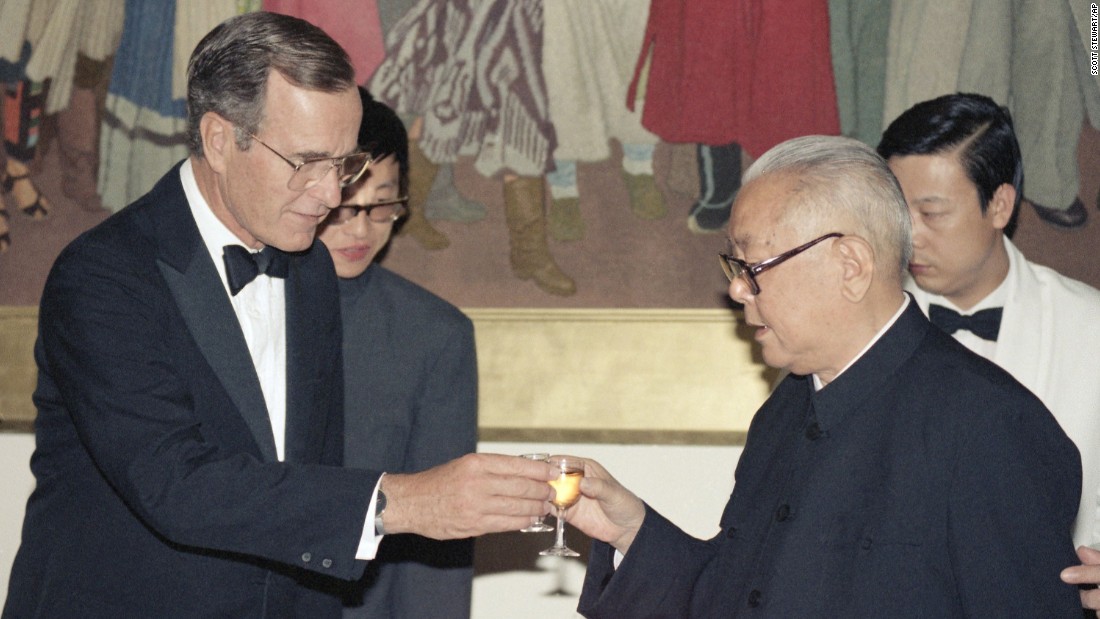 Then U.S. Vice President George H. W. Bush proposes a toast to former Chinese President Li Xiannian during a dinner at the Chinese Embassy in Washington D.C. in July, 1985. Li, the first Chinese head of state to visit the United States, hosted the dinner in Bush&#39;s honor.