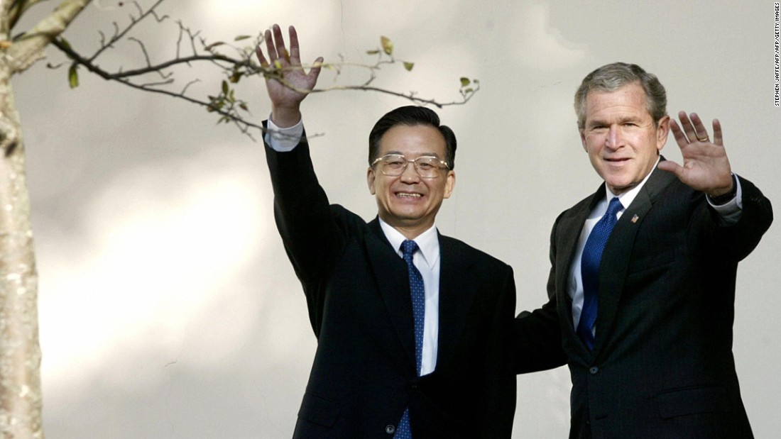 U.S. President George W. Bush and former Chinese Premier Wen Jiabao walk along the colonnade before a meeting at the White House in Washington, D.C. on December 9, 2003. Speaking with Bush at his side in the Oval Office, Wen warned Taiwan not to seek independence, while Bush reaffirmed the so-called &quot;One China&quot; policy of the United States, which maintained that Taiwan is a part of China.