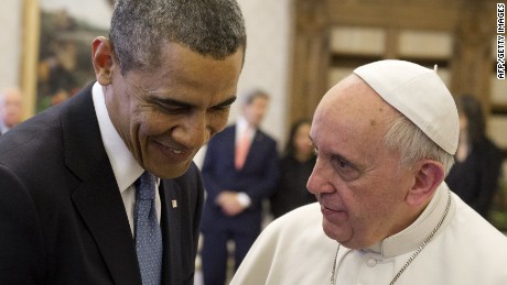 Pope Francis (R) speaks with US President Barack Obama during a private audience on March 27, 2014 at the Vatican. The meeting at the Vatican comes as a welcome rest-stop for Obama during a six-day European tour dominated by the crisis over Crimea, and the US leader will doubtless be hoping some of the pope&#39;s overwhelming popularity will rub off on him.    AFP PHOTO / SAUL LOEB        (Photo credit should read SAUL LOEB/AFP/Getty Images)