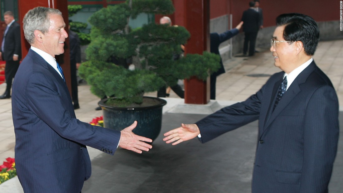 Former Chinese President Hu Jintao greets U.S. President George W. Bush in Beijing, China in August, 2008. Bush attended the opening ceremony of the 2008 Summer Olympics Games in Beijing during his trip to Asia that month.