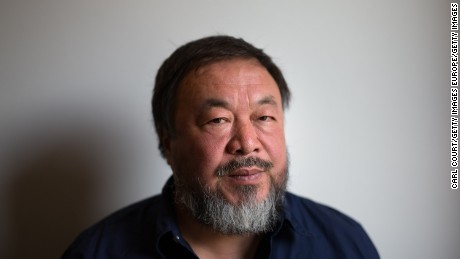 LONDON, ENGLAND - SEPTEMBER 11: Chinese artist Ai Weiwei poses for a photograph after a press conference at the Royal Academy of Arts on September 11, 2015 in London, England. Ai Weiwei spoke to the media ahead of his forthcoming exhibition at the Academy which runs from September 19 to December 13, 2015. (Photo by Carl Court/Getty Images)