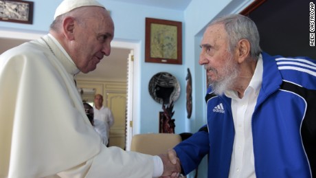 Pope Francis and Cuba&#39;s Fidel Castro shake hands, in Havana, Cuba, Sunday, Sept. 20, 2015. The Vatican described the 40-minute meeting at Castro&#39;s residence as informal and familial, with an exchange of books. (AP Photo/Alex Castro)