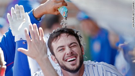 Fernando Rodney of the Chicago Cubs  pours sunflower seeds onto Kris Bryant in 2015. 