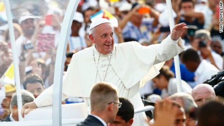 Pope Francis arrives to celebrate Mass in Revolution Square in Havana, Cuba, Sunday, Sept. 20, 2015. Pope Francis opens his first full day in Cuba on Sunday with what normally would be the culminating highlight of a papal visit: Mass before hundreds of thousands of people in Havana&#39;s Revolution Plaza.  (Tony Gentile/POOL via AP)