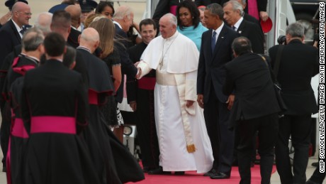 JOINT BASE ANDREWS, MD - SEPTEMBER 22:  Pope Francis shakes hands with Vice President Joe Biden along with U.S. President Barack Obama, first lady Michelle Obama, and other political and Catholic church leaders after arriving from Cuba September 22, 2015 at Joint Base Andrews, Maryland. Francis will be visiting Washington, New York City and Philadelphia during his first trip to the United States as Pope. (Photo by Chip Somodevilla/Getty Images)