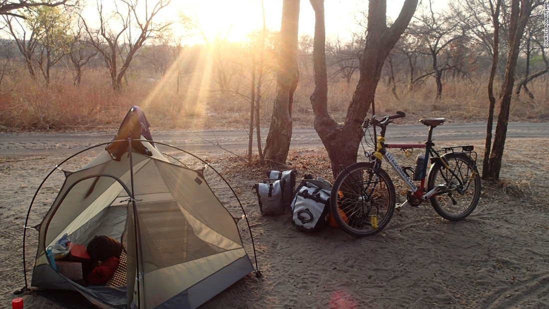 Rutland&#39;s bicycle and second tent, camped in the Ugandan bush. He lost his first tent in a fire on his first night in the Mozambique bush, which he started by knocking over his gas stove. 