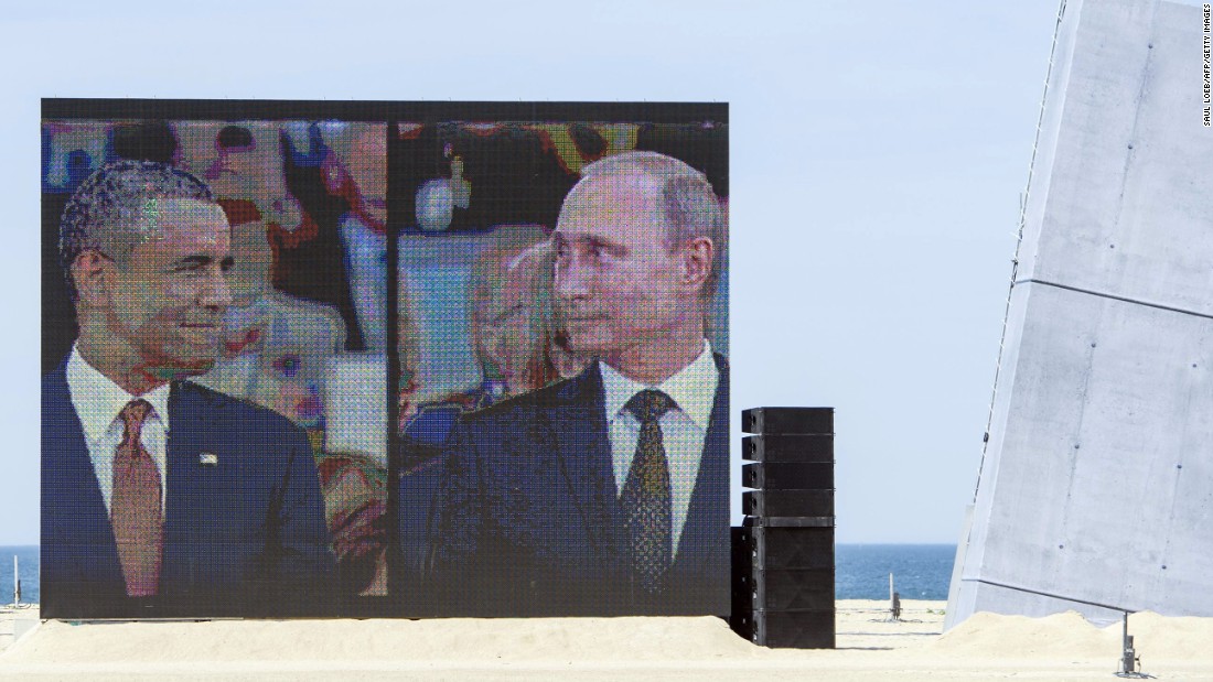 Obama and Putin share a comical and awkward moment on a large split-screen during an international ceremony on the stretch code-named Sword Beach, in Ouistreham, France, to commemorate the Allied invasion of Normandy on June 6, 2014. Obama and Putin had an informal 15-minute chat during lunch at the ceremony that marked the 70th anniversary of the D-day landings. &quot;It&#39;s a positive thing that they spoke, but more needs to be done,&quot; a senior U.S. official said at the time.