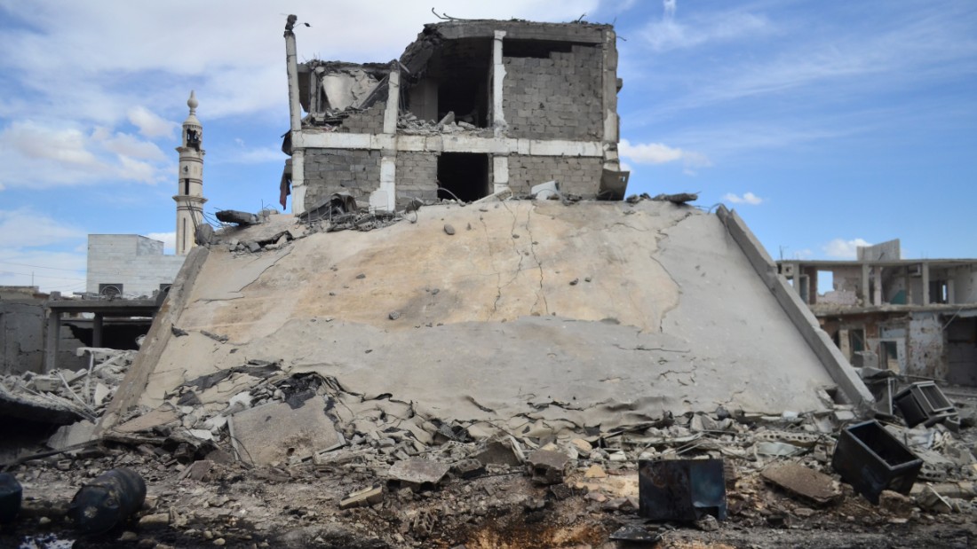 A picture taken on September 30, 2015 shows damaged buildings and a minaret in the central Syrian town of Talbisseh in the Homs province.  Russian warplanes carried out air strikes in three Syrian provinces, including Homs, along with regime aircraft on September 30, according to a Syrian security source. Earlier in the day, the Syrian Observatory for Human Rights, a Britain-based monitor, reported at least 27 civilians had been killed in air strikes in the Homs province, adding that the strikes hit Rastan, Talbisseh and Zaafarani. The other Syrian security source said the Russian strikes had hit Rastan and Talbisseh in the province of Homs. AFP PHOTO / MAHMOUD TAHA        (Photo credit should read MAHMOUD TAHA/AFP/Getty Images)