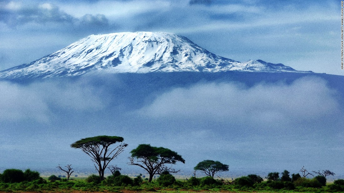 At 19,340 feet, Kilimanjaro is Africa&#39;s highest peak, but the climb to the top is surprisingly accessible and can take as little as 4-5 days on the so-called &quot;fast route.&quot; In fact, the fastest ever summit was achieved by Italian Bruno Brunod, who managed to reach the peak in 5 hours 38 minutes.&lt;br /&gt;&lt;br /&gt;The journey to the top from the steppes below takes in all manner of ecosystems, stretching from agrarian landscapes to rainforest, heath to alpine desert before arctic conditions at the summit. At the top of the mountain lies a simple wooden box in which climbers can record their thoughts.